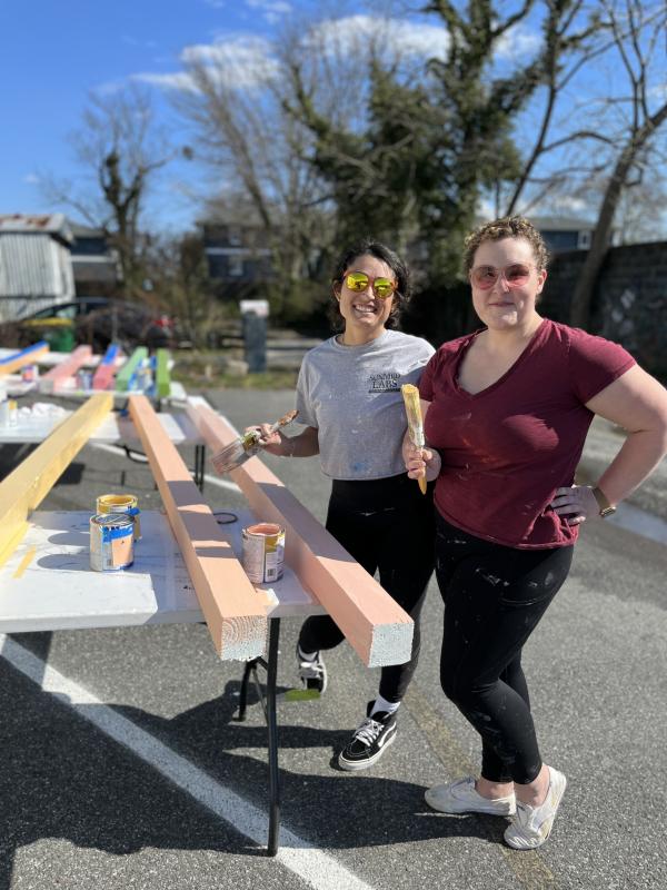 Developing Artist Collaboration staff member Laura Gaeng, left, and DAC artist member Emily Widdoes spent about three weeks working on the poles to identify streets from the beach in Dewey. SUBMITTED PHOTO